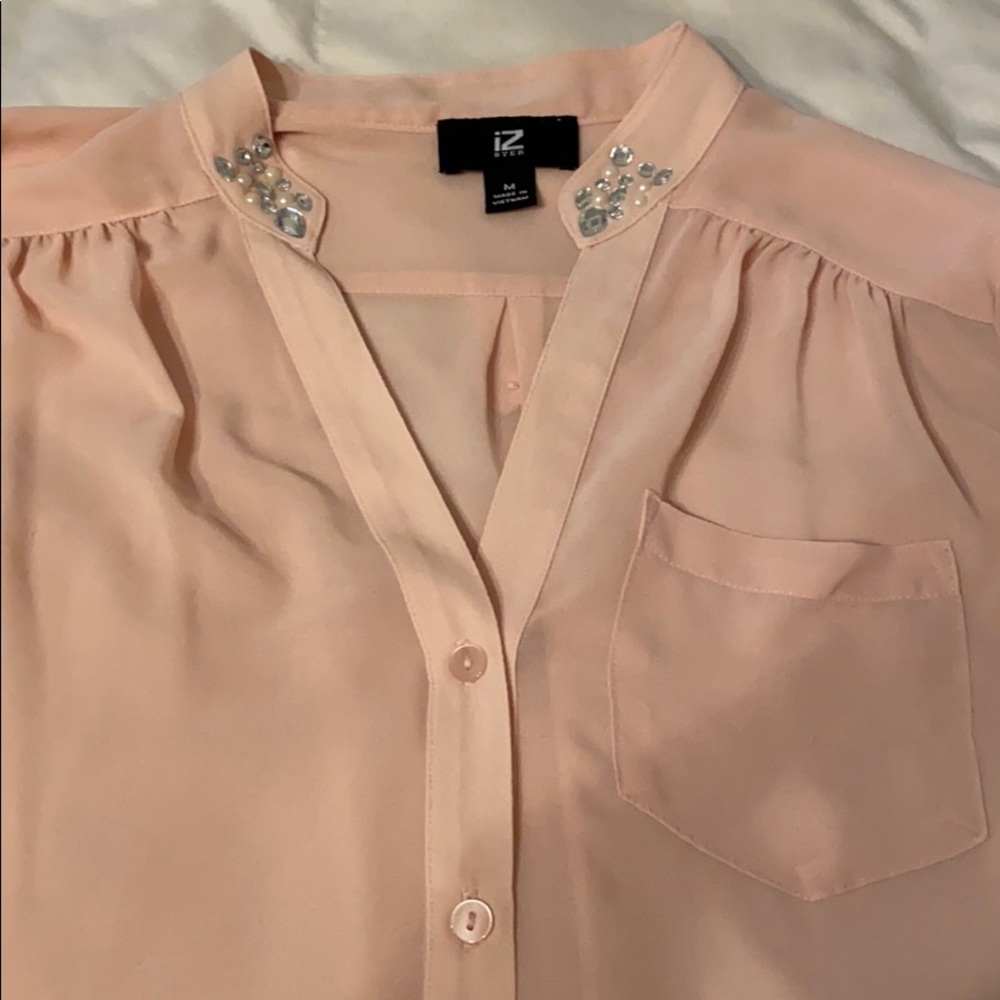 Pink quarter length sleeve shirt